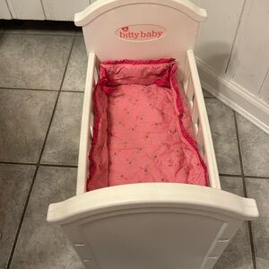 Retired Bitty baby crib with bumper/mattress insert.